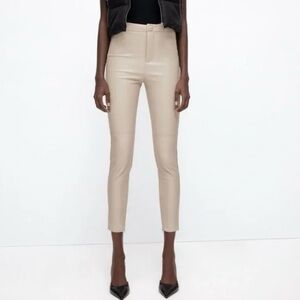 Zara high rise cream faux leather pants with ankle zip detail